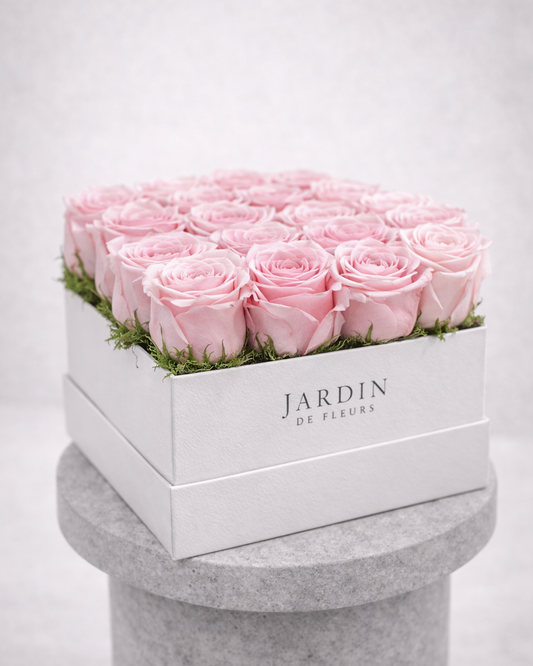 Pink roses in a box